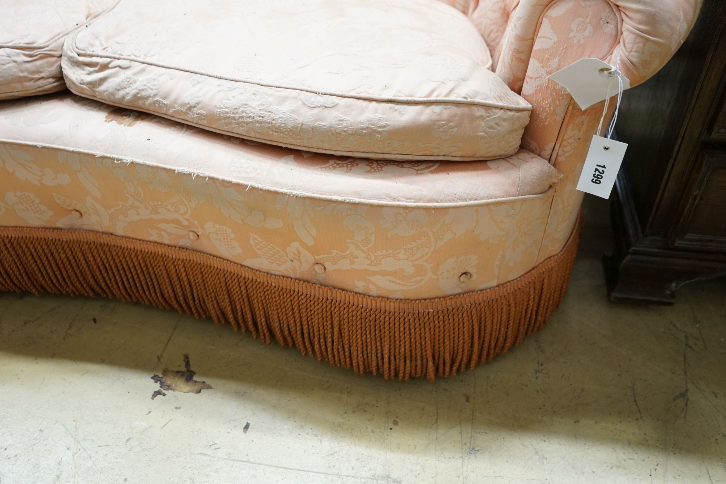 A mid century tub frame settee upholstered in buttoned pink damask, length 160cm, depth 76cm, height 76cm